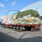 KingAAA incoming used clothing supply truck arriving at Guangzhou warehouse for incoming material inspection before sorting and grading.