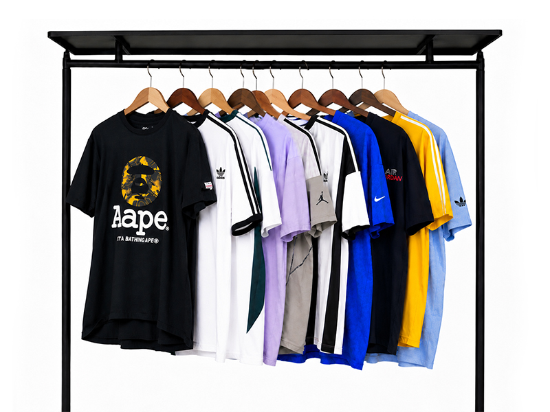 KingAAA wholesale branded used clothing - mixed branded t-shirts and tops sorted for export to Africa, Middle East, and global importers.