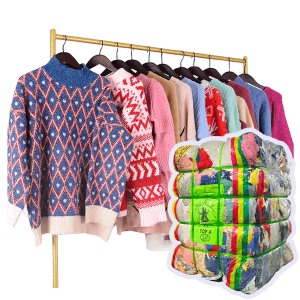 a rack of sweaters and a bag of clothes